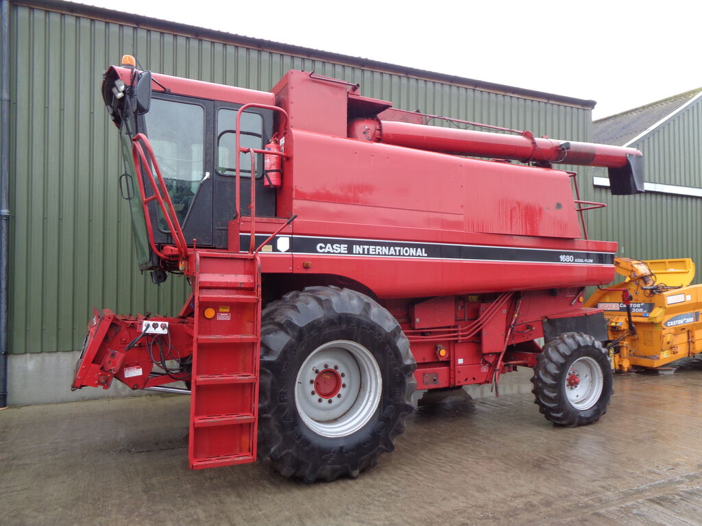 farm-equipment-combine-harvesterCASE-IH-International-1680-Axial-Flow-Rotary-Combine---1574963111425959549_big--19112819440763229500